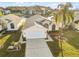 Ariel view of charming single Gathering home with a well-manicured lawn and landscaping at 4411 Whitton Way, New Port Richey, FL 34653