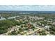 Home is located on a tree-lined street with easy access to nearby community amenities at 4425 Porpoise Dr, Tampa, FL 33617