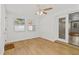 Sunroom featuring new floors, large windows and lots of light at 4425 Porpoise Dr, Tampa, FL 33617