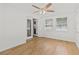 Sunroom featuring new floors, large windows and lots of light at 4425 Porpoise Dr, Tampa, FL 33617