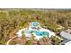 Aerial view of the community pool and recreation area, perfect for Gathering fun and neighborhood gatherings at 4679 Emprise Way, Land O Lakes, FL 34638
