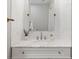 Stylish bathroom featuring white subway tile, marble countertop, and a modern sink at 4679 Emprise Way, Land O Lakes, FL 34638