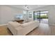 Comfortable living room with modern furniture and a view of the screened patio at 4679 Emprise Way, Land O Lakes, FL 34638
