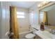 Clean bathroom featuring a shower-tub combo, single sink vanity, and modern fixtures at 4783 Palermo Ne Ct # 4783, St Petersburg, FL 33703
