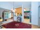 Open-concept dining area with adjacent kitchen and living room, ideal for modern living at 4783 Palermo Ne Ct # 4783, St Petersburg, FL 33703