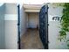 Inviting gated entrance with tiled walkway, enhancing privacy and curb appeal at 4783 Palermo Ne Ct # 4783, St Petersburg, FL 33703