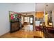 Open-concept living room showcasing architectural details, natural light, and tile flooring at 4783 Palermo Ne Ct # 4783, St Petersburg, FL 33703