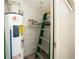 Functional utility room with shelving and equipment, offering practical storage solutions at 4783 Palermo Ne Ct # 4783, St Petersburg, FL 33703