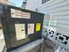 Energy-efficient AC unit with detailed information labels for peak performance and savings at 4851 W Gandy Blvd # B1L8, Tampa, FL 33611