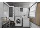 Functional laundry room features a washer and dryer at 4851 W Gandy Blvd # B1L8, Tampa, FL 33611