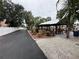Long view of the covered picnic area that has plenty of space and a grill area for residents' use at 4851 W Gandy Blvd # B1L8, Tampa, FL 33611
