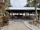 Picture of the covered picnic and grill area that includes lights, seating and a large grilling area at 4851 W Gandy Blvd # B1L8, Tampa, FL 33611