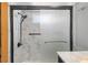 Beautifully tiled shower with modern fixtures and a glass enclosure at 4851 W Gandy Blvd # B1L8, Tampa, FL 33611