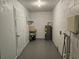 Unfinished basement with shelving and water heater at 505 Innergary Pl, Valrico, FL 33594