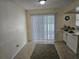 Dining area with sliding glass doors providing ample light and patio access at 505 Innergary Pl, Valrico, FL 33594