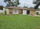 Charming home with a well-manicured lawn and stylish exterior accents at 505 Innergary Pl, Valrico, FL 33594