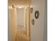 Hallway with neutral paint and tile flooring, offering access to various rooms at 505 Innergary Pl, Valrico, FL 33594