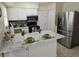 Bright kitchen with stainless steel refrigerator and plenty of counter space at 505 Innergary Pl, Valrico, FL 33594