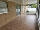 Screened-in patio area with tile flooring and lots of light at 505 Innergary Pl, Valrico, FL 33594
