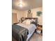 Comfortable bedroom featuring a cozy bed, soft carpet, natural light, and stylish decor for relaxation at 5351 Leisure Ln, New Port Richey, FL 34652