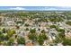 An aerial shot of suburban neighborhood with tree lined streets on a sunny day at 621 89Th N Ave, St Petersburg, FL 33702