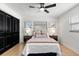Relaxing bedroom showcasing a full bed with neutral tones, soft textures, and ample closet space at 621 89Th N Ave, St Petersburg, FL 33702