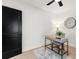 Office featuring a modern desk, dark trim, and natural light at 621 89Th N Ave, St Petersburg, FL 33702