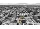 A street view of the neighborhood with many trees shows the house location with a white border at 621 89Th N Ave, St Petersburg, FL 33702