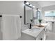 Modern bathroom with dual vanities, sleek fixtures, and elegant finishes, creating a spa-like retreat at 6738 Criswell N Ave, St Petersburg, FL 33709