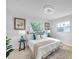 Bright bedroom featuring a comfortable bed, stylish decor, and plenty of natural light from the windows at 6738 Criswell N Ave, St Petersburg, FL 33709