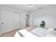 Bedroom features a spacious closet and ample sunlight, providing a bright and airy atmosphere at 6738 Criswell N Ave, St Petersburg, FL 33709