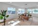 Inviting living room with hardwood floors, comfortable seating, and bright natural light at 6738 Criswell N Ave, St Petersburg, FL 33709