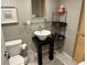 A modern bathroom featuring wall art, stylish sink, and tiled floors at 701 S Madison Ave # 515, Clearwater, FL 33756