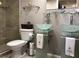 A modern bathroom featuring glass bowl sinks, stylish fixtures, and tiled shower at 701 S Madison Ave # 515, Clearwater, FL 33756