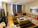 Comfortable living room with sectional sofa, modern art, and plenty of space to relax at 701 S Madison Ave # 515, Clearwater, FL 33756