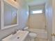 Bathroom with a sink, toilet and bathtub at 7114 Cromwell Park Ln, Apollo Beach, FL 33572