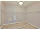 Walk-in closet with laminate flooring and wire shelving at 7114 Cromwell Park Ln, Apollo Beach, FL 33572