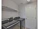 Laundry room with a washer and dryer at 7114 Cromwell Park Ln, Apollo Beach, FL 33572