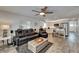 Spacious living room featuring an open floor plan connecting to the kitchen, perfect for entertaining guests at 719 58Th S St, Gulfport, FL 33707