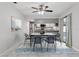 Dining room with a table, chairs, and a view of the kitchen at 7503 Winchester Dr, Tampa, FL 33615
