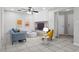 Bright living room with tile flooring, modern decor, and ample natural light at 7503 Winchester Dr, Tampa, FL 33615