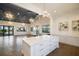 Open area with island, lots of cabinets and access to the pool at 7616 Paradiso Dr, Apollo Beach, FL 33572