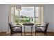Relaxing view of the lake from the indoor seating area at 8014 Lotus Dr, Port Richey, FL 34668
