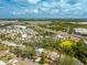 An aerial view captures the community near the highway, highlighting the lush surroundings and commercial centers nearby at 8335 42Nd N Ave, St Petersburg, FL 33709