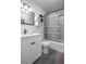 Cozy bathroom featuring a sleek vanity, bathtub with shower, and modern fixtures offers functionality at 8335 42Nd N Ave, St Petersburg, FL 33709
