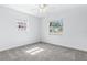 Bright bedroom with two windows and neutral carpet is a cozy and inviting space at 8335 42Nd N Ave, St Petersburg, FL 33709