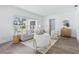 Inviting living room with stylish seating, large windows, and a bright atmosphere at 8335 42Nd N Ave, St Petersburg, FL 33709