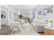 Bright living room featuring modern furniture, large windows, and an open layout at 8335 42Nd N Ave, St Petersburg, FL 33709