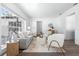 Stylish living room featuring a large window, a sofa, and modern decor for a comfortable atmosphere at 8335 42Nd N Ave, St Petersburg, FL 33709