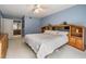 Comfortable bedroom featuring a ceiling fan and built-in shelves for convenient storage at 9806 Bennington Dr, Tampa, FL 33626